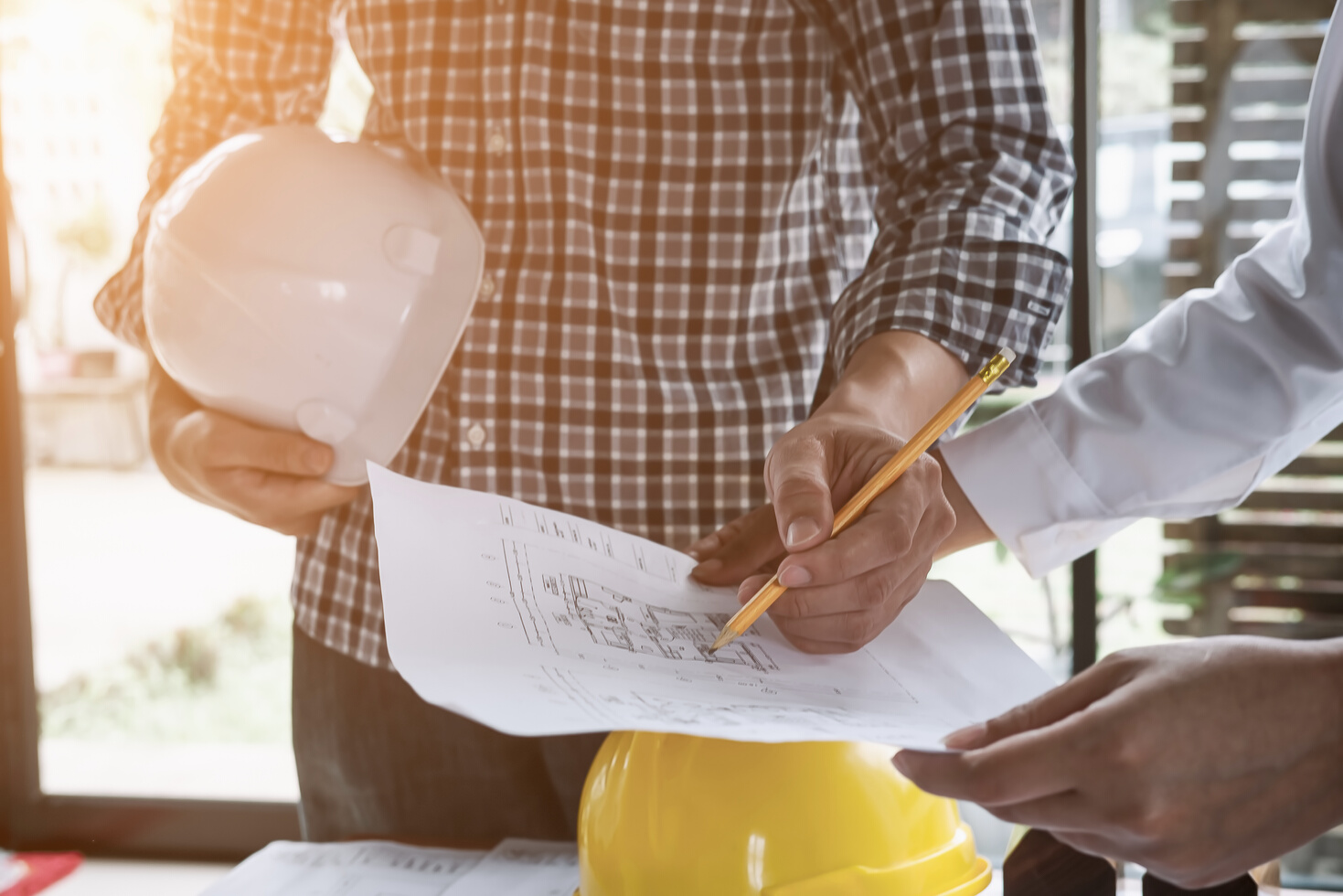 Engineer Checking Blueprints
