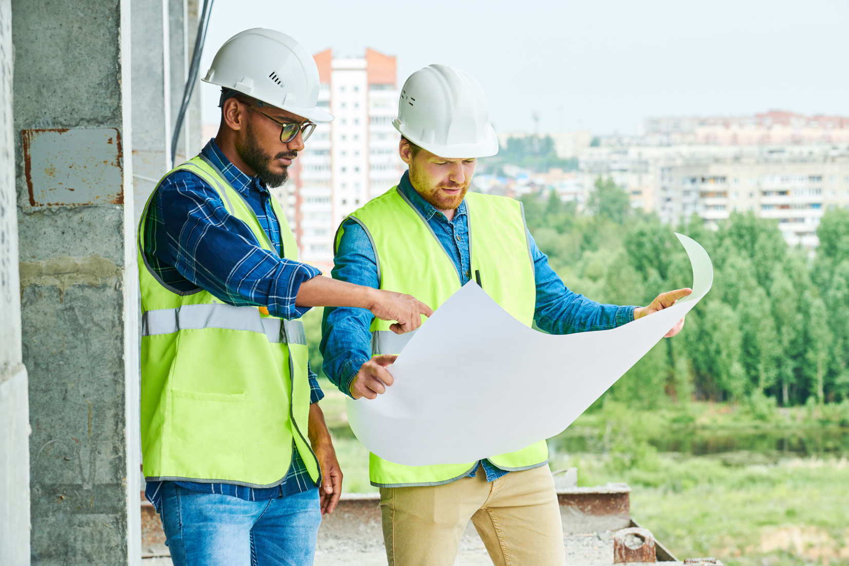 Engineers Discussing Construction Plans