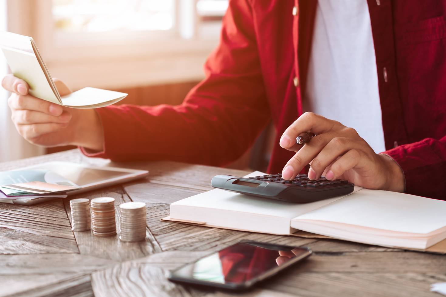 Man Calculating His Finances 