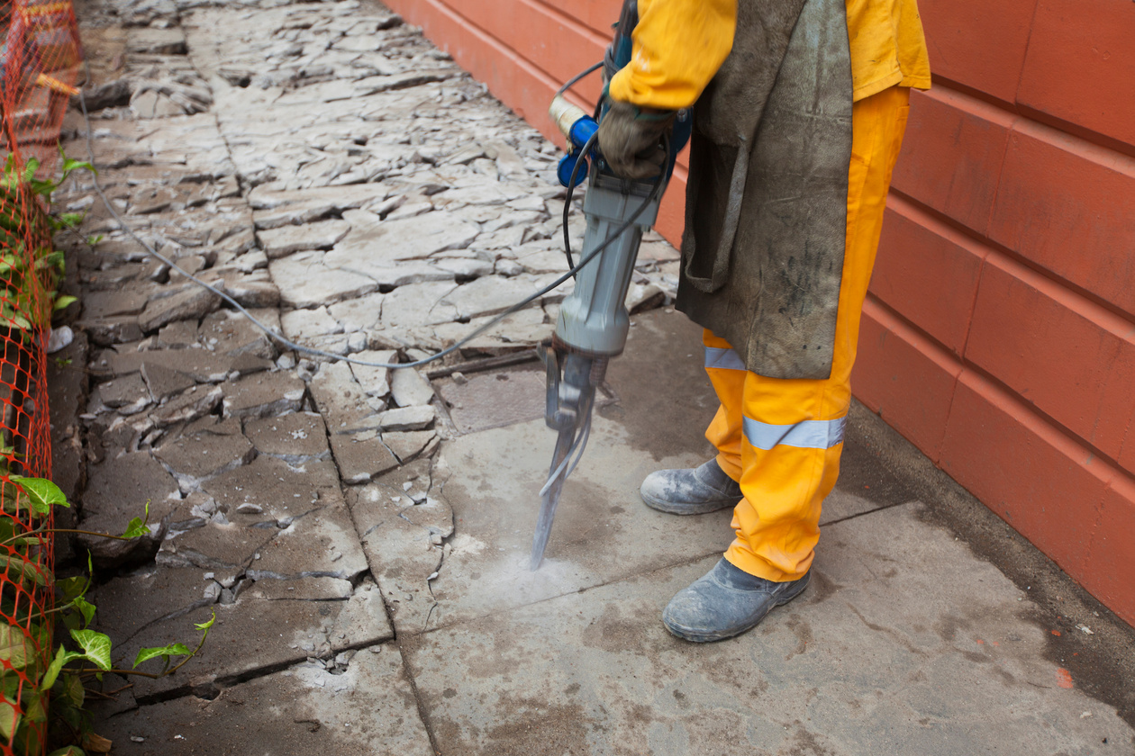 Worker operating the stone breaker