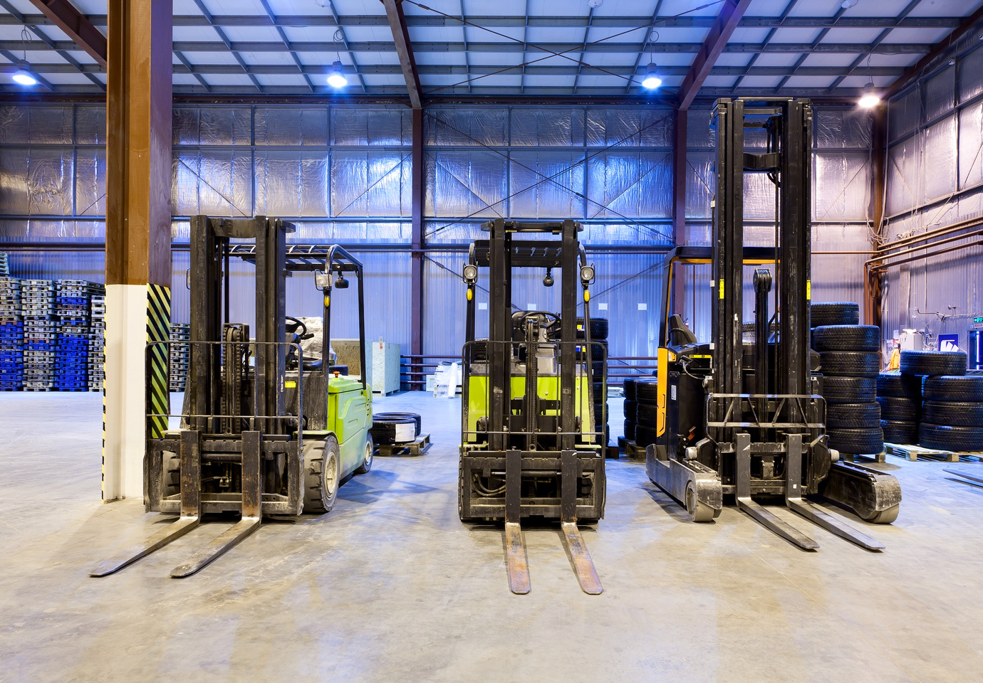 Forklifts in warehouse
