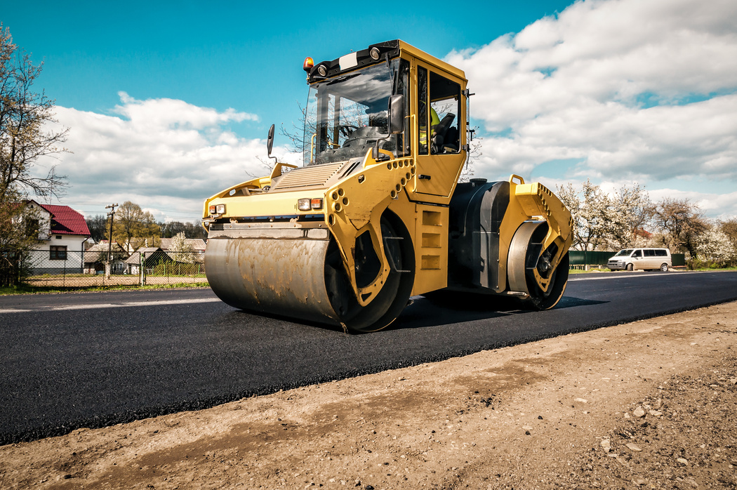 road roller laying asphalt